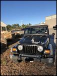 2004 Jeep Wrangler sport-e948043a-5a18-4667-b38b-16b1ed62b228