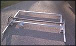Aluminum wall mount folding tire rack-imag0525-jpg